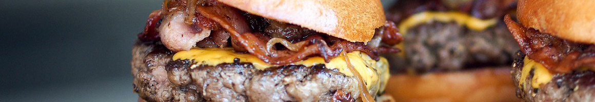 Eating Burger Hot Dog at Ricky's Thick N' Juicy Burgers restaurant in Baytown, TX.
